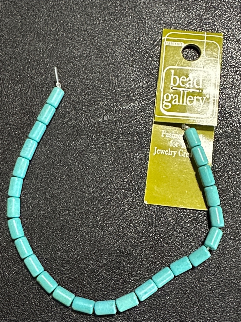 31.  Dyed Semi Precious Stone Turquoise Dyed Howlite 5x8mm Tube Beads